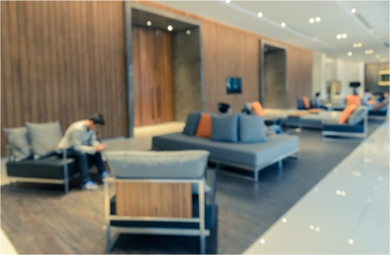 An image of a hotel lobby with comfy seats.